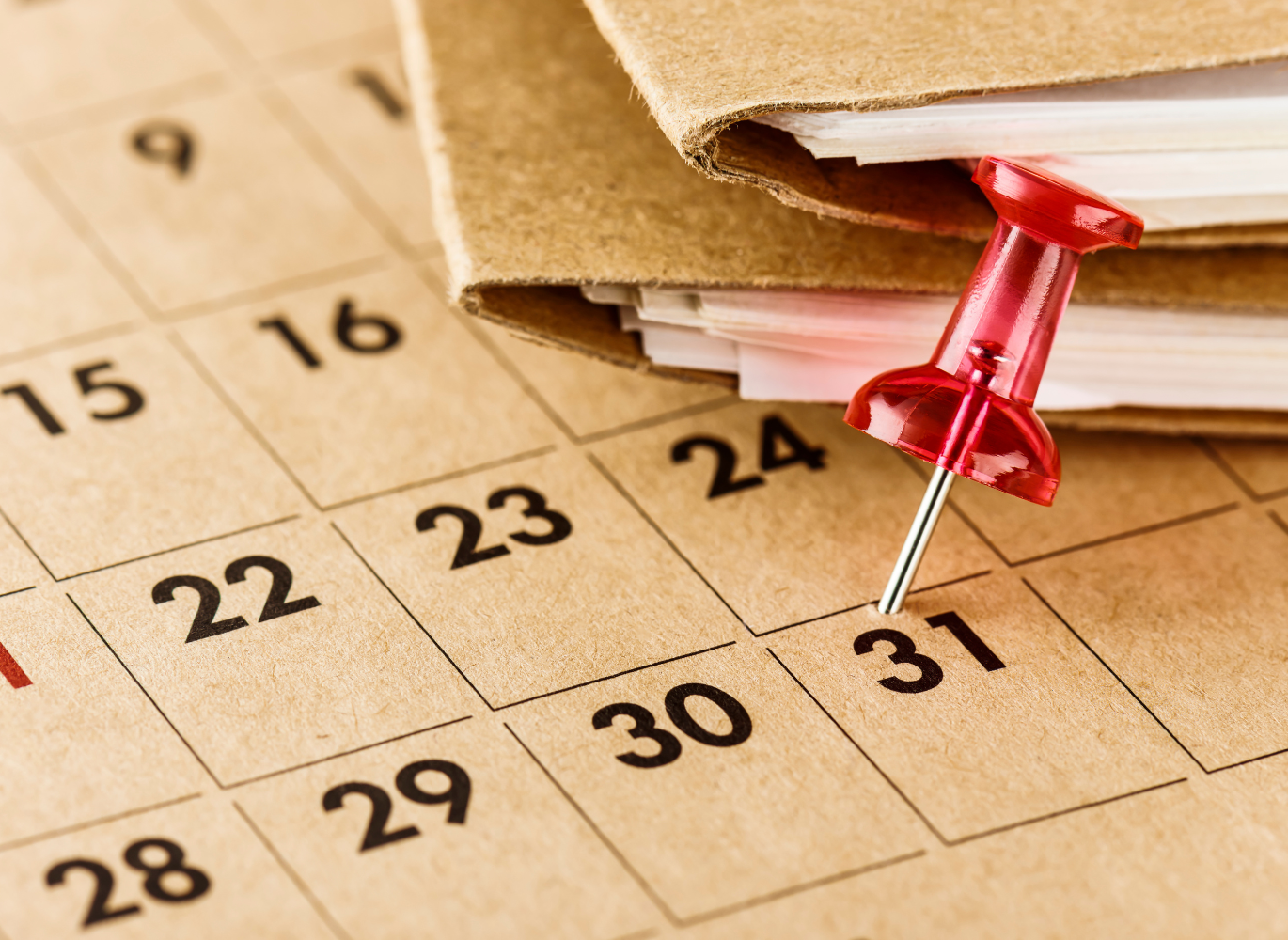 Photo of a calendar with a tack in the date of the 31st