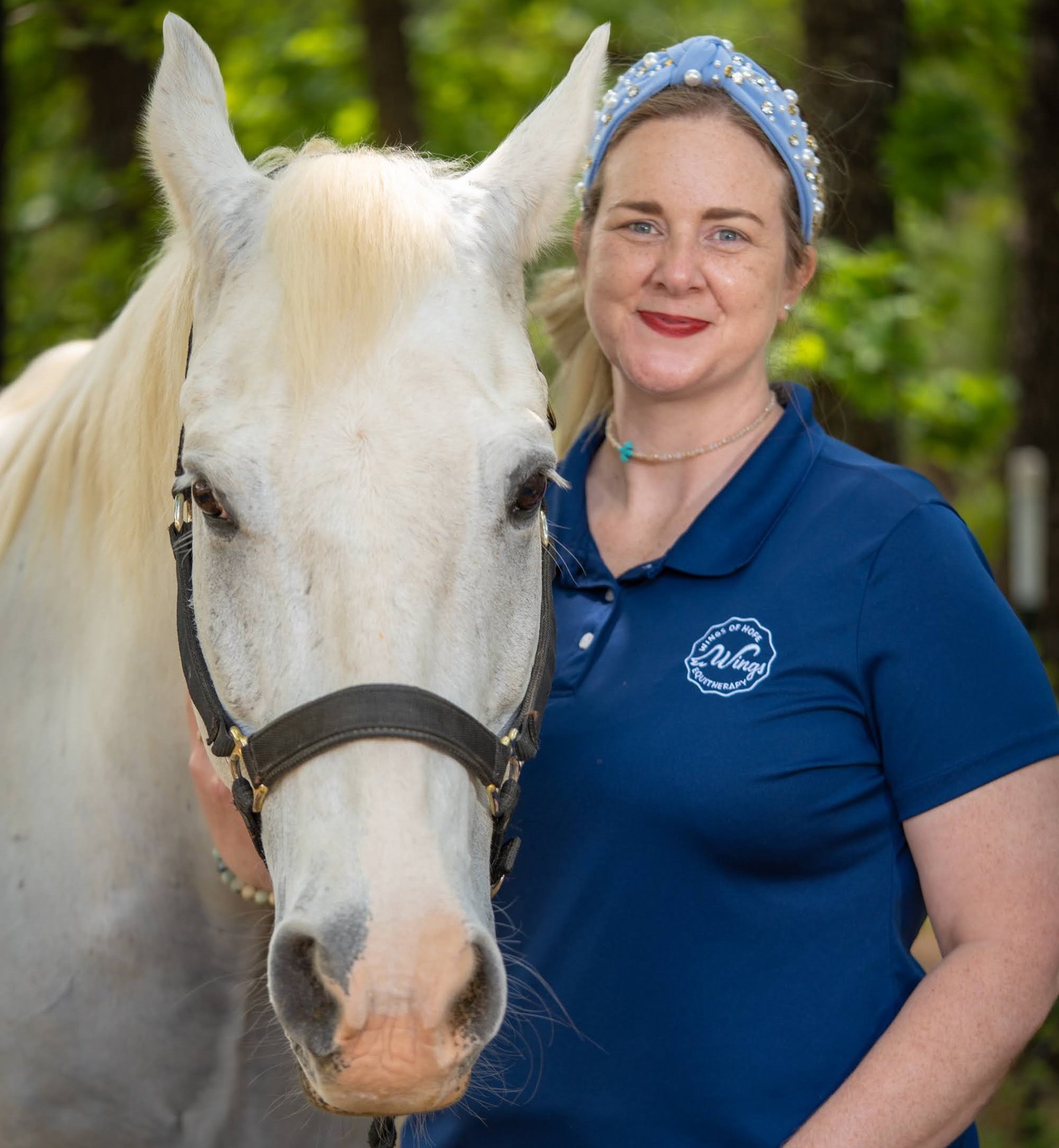 Woman with white horse